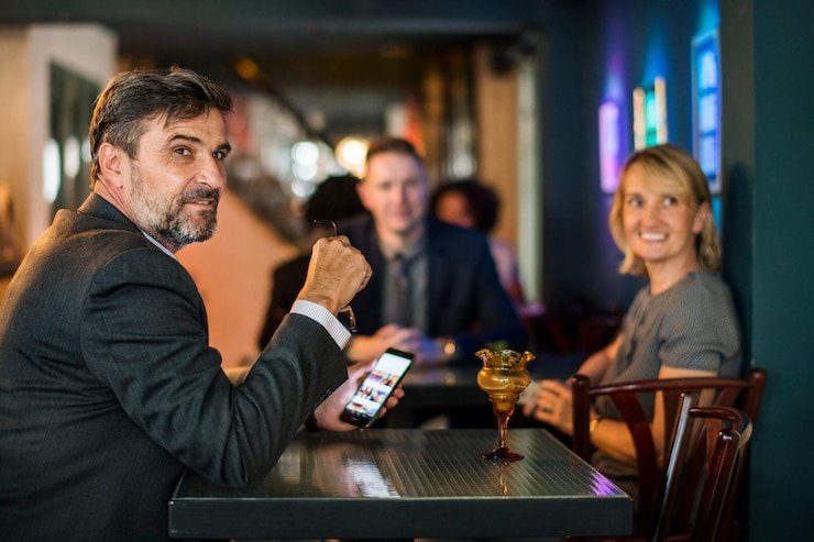 Golden Toad live casino table interface on Android phone showing dealer, cards, and betting area